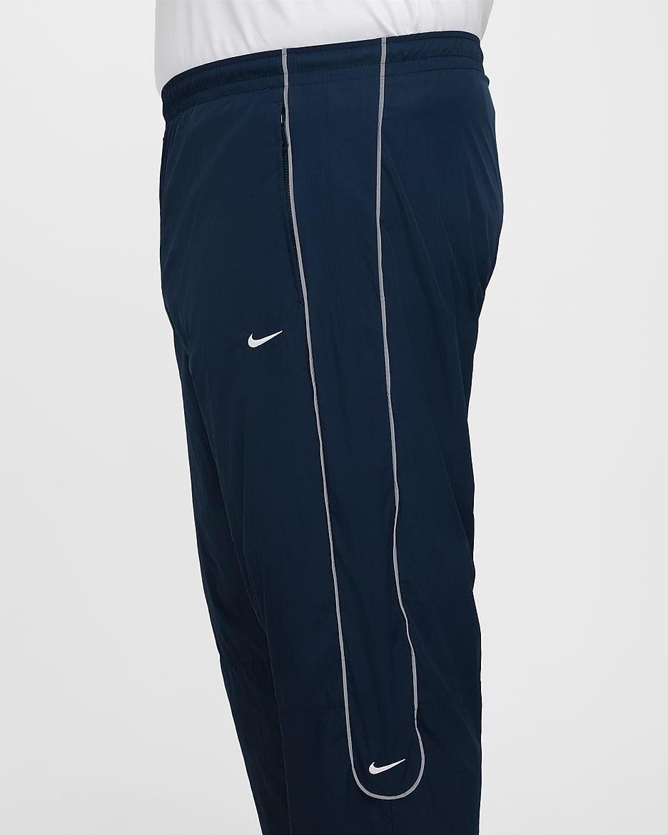 Nike tracksuit bottoms mens best sale